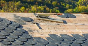 shingles on a roof being taken off